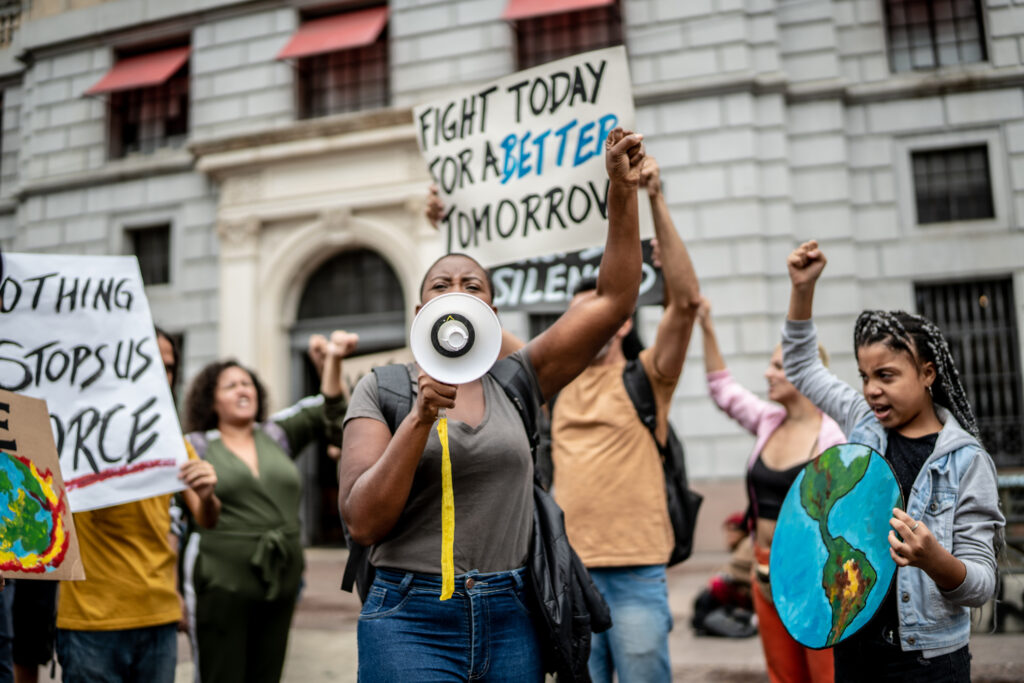 Protesters Holding Signs During On A Demonstration